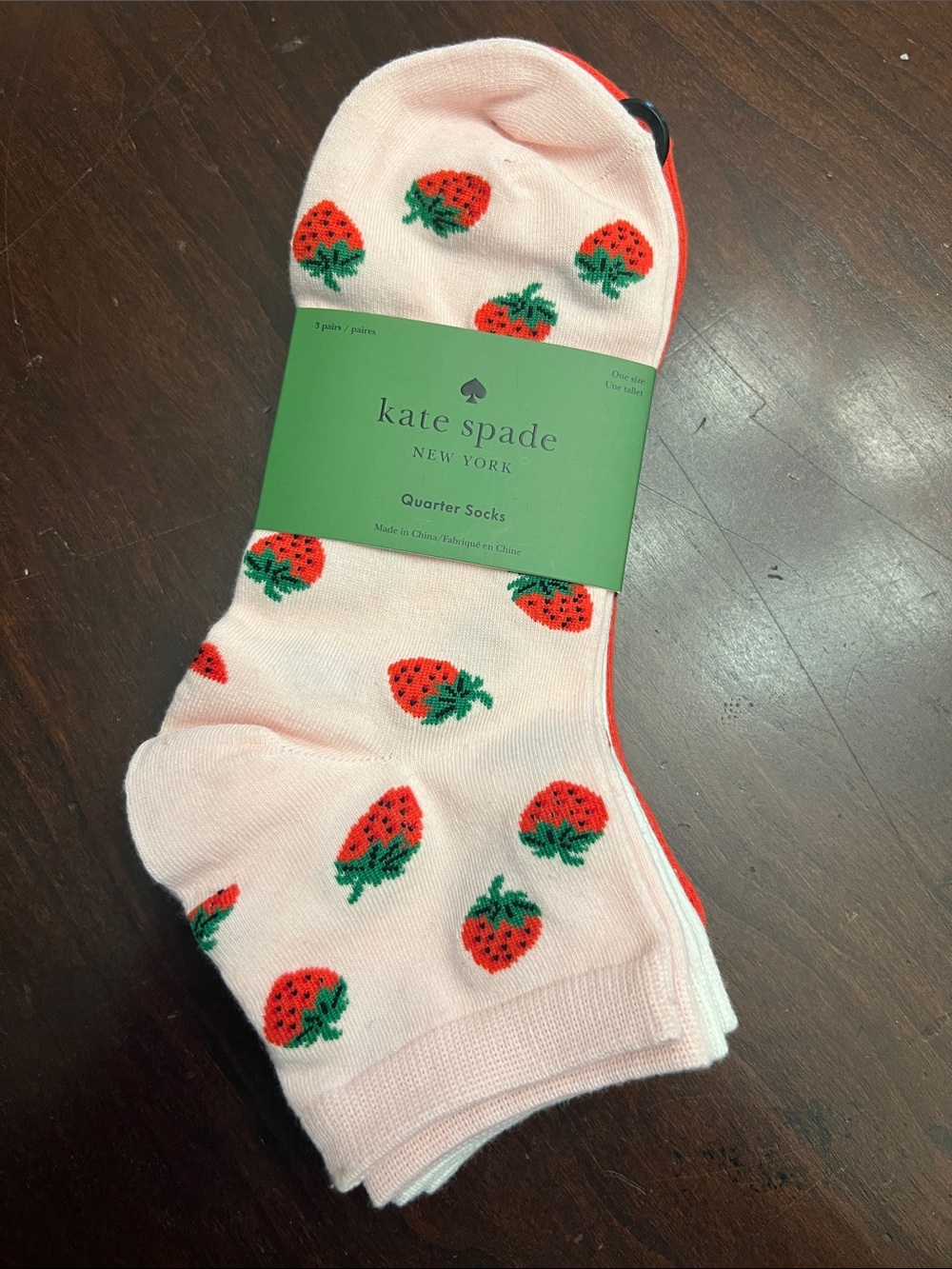 kate spade pink socks with strawberry motif